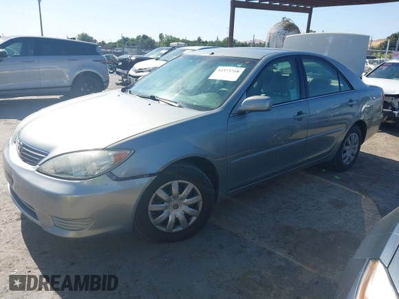 2005 Toyota Camry LE z VIN 4T1BE30K65U592500, wystawiony jako IAAI lot #42373718 z przebiegiem 189 054 mil mil oraz . Historia ofert i sprzedaży dostępna na DreamBid. Obrazek 19.