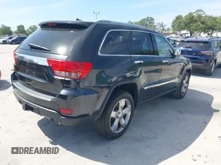 2011 Jeep Grand Cherokee Overland with VIN 1J4RS6GT4BC584029, listed as a IAAI auction lot 42088953 with 144,777 mi miles and . Bid and sale history available at DreamBid. Image 4.