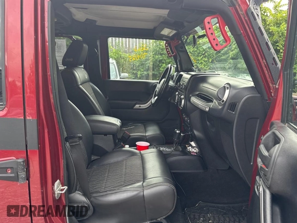 2012 Jeep Wrangler Unlimited Sport with VIN 1C4BJWDG5CL289329, listed as a Copart auction lot 65816775 with 152,632 mi miles and Clean title. Bid and sale history available at DreamBid. Image 5.