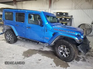2021 Jeep Wrangler Unlimited Rubicon with VIN 1C4HJXFN6MW756530, listed as a Copart auction lot 51976395 with Not provided miles and Salvage title. Bid and sale history available at DreamBid. Image 4.