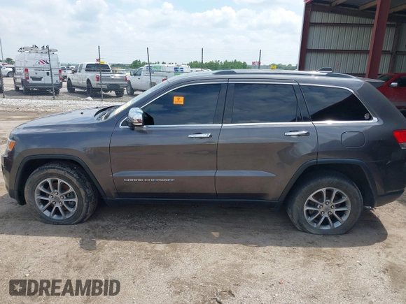 2014 Jeep Grand Cherokee Limited z VIN 1C4RJFBG5EC431229, wystawiony jako IAAI lot #42436481 z przebiegiem 102 442 mil mil oraz . Historia ofert i sprzedaży dostępna na DreamBid. Obrazek 14.