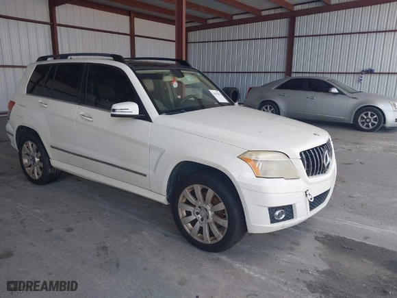2012 Mercedes-Benz GLK-Class GLK 350 with VIN WDCGG5GBXCF779076, listed as a IAAI auction lot 42018507 with 221,593 mi miles. Bid and sale history available at carsss.com. Image 1.