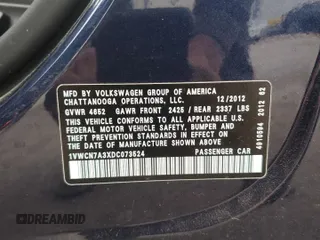 2013 Volkswagen Passat SEL Premium z VIN 1VWCN7A3XDC073524, wystawiony jako Copart lot #46759305 z przebiegiem 118 780 mil mil oraz Szkoda całkowita • Salvage title. Historia ofert i sprzedaży dostępna na DreamBid. Obrazek 14.