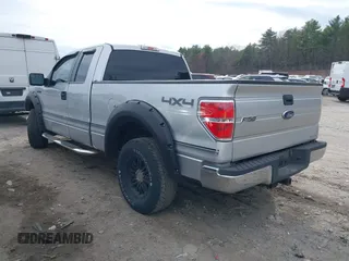 2011 Ford F-150 XL with VIN 1FTEX1EM9BFA54173, listed as a IAAI auction lot 42009894 with 149,710 mi miles. Bid and sale history available at carsss.com. Image 3.