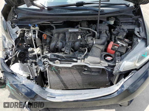 2015 Honda Fit EX-L z VIN 3HGGK5H80FM704920, wystawiony jako Copart lot #59834245 z przebiegiem 86 415 mil mil oraz Szkoda całkowita • Salvage title. Historia ofert i sprzedaży dostępna na DreamBid. Obrazek 11.