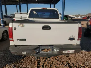 1999 Ford F-250 XL with VIN 1FTNX21L5XEE86694, listed as a Copart auction lot 41697885 with 153,948 mi miles and Salvage title. Bid and sale history available at DreamBid. Image 6.