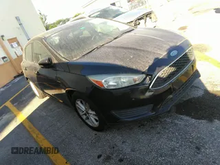 2015 Ford Focus SE with VIN 1FADP3K28FL307328, listed as a IAAI auction lot 41511645 with 120,787 mi miles. Bid and sale history available at carsss.com. Image 1.