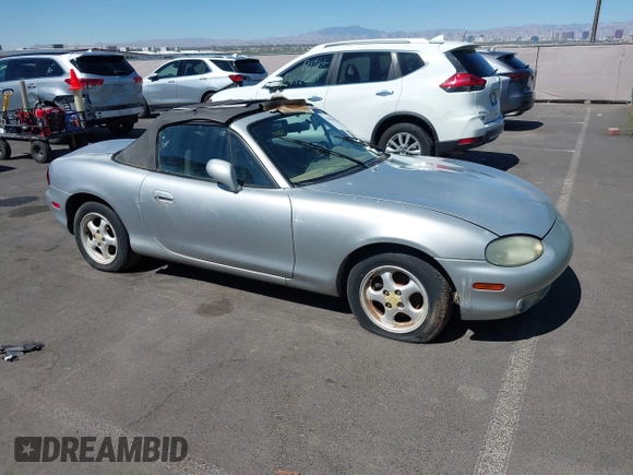 2000 Mazda MX-5 Miata z VIN JM1NB3536Y0142627, wystawiony jako IAAI lot #42820470 z przebiegiem 116 989 mil mil oraz . Historia ofert i sprzedaży dostępna na DreamBid. Obrazek 1.