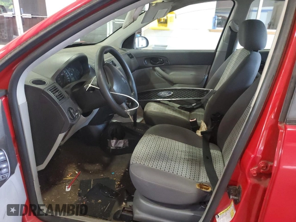 2007 Ford Focus S z VIN 1FAFP34N17W232021, wystawiony jako Copart lot #59553335 z przebiegiem 172 576 mil mil oraz Czysty tytuł • Clean title. Historia ofert i sprzedaży dostępna na DreamBid. Obrazek 7.