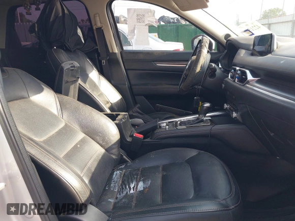 2020 Mazda CX-5 Grand Touring with VIN JM3KFADM5L0739306, listed as a IAAI auction lot 42215667 with 126,100 mi miles and . Bid and sale history available at DreamBid. Image 5.