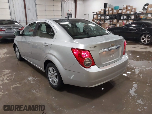 2014 Chevrolet Sonic LT with VIN 1G1JC5SG8E4107664, listed as a IAAI auction lot 41614306 with 128,946 mi miles and . Bid and sale history available at DreamBid. Image 3.