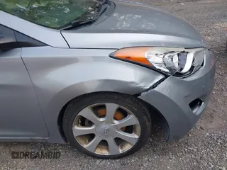 2012 Hyundai Elantra Limited with VIN KMHDH4AE0CU374001, listed as a IAAI auction lot 42394880 with 99,282 mi miles and . Bid and sale history available at DreamBid. Image 6.
