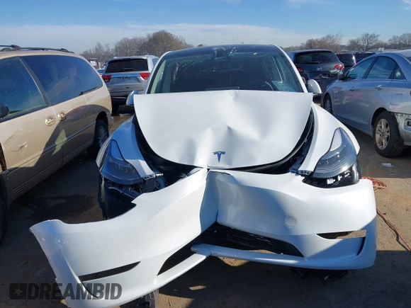 2025 Tesla Model Y Long Range with VIN 7SAYGDED9SA342374, listed as a IAAI auction lot 41663085 with 4,115 mi miles and . Bid and sale history available at DreamBid. Image 11.