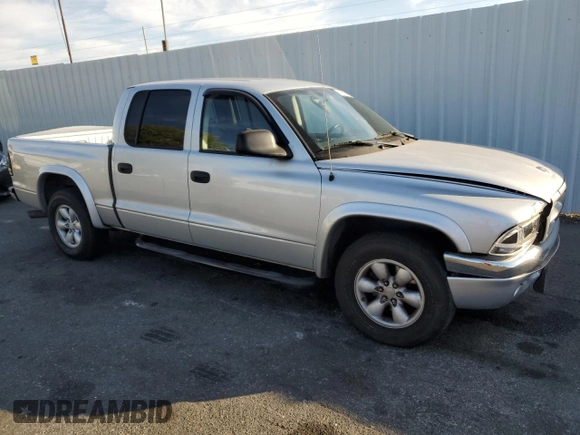 2004 Dodge Dakota Sport with VIN 1D7HL38N44S573883, listed as a Copart auction lot 74955984 with 165,510 mi miles and Salvage Title. Bid and sale history available at carsss.com. Image 4.