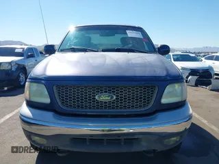 2003 Ford F-150 XL with VIN 1FTRX18WX3NA22323, listed as a IAAI auction lot 41635869 with 129,029 mi miles. Bid and sale history available at carsss.com. Image 12.