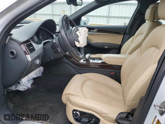2012 Audi A8 с VIN WAUAVAFD0CN036751, выставлен на аукционе Copart как лот 86383784 с пробегом 96 658 миль миль и Списание • Salvage title. История ставок и продаж доступна на DreamBid. Изображение 7.
