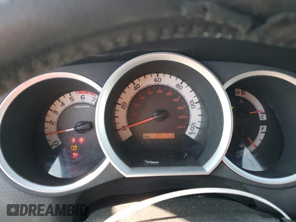2013 Toyota Tacoma z VIN 5TFUX4EN3DX018529, wystawiony jako Copart lot #77794934 z przebiegiem 186 050 mil mil oraz Szkoda całkowita • Salvage title. Historia ofert i sprzedaży dostępna na DreamBid. Obrazek 9.