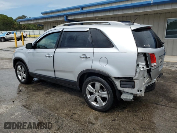 2012 Kia Sorento EX z VIN 5XYKU4A27CG229651, wystawiony jako Copart lot #60314715 z przebiegiem 117 876 mil mil oraz Szkoda całkowita • Salvage title. Historia ofert i sprzedaży dostępna na DreamBid. Obrazek 2.