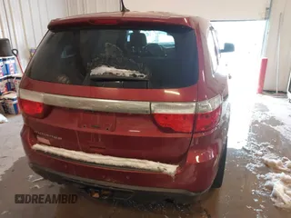 2013 Dodge Durango SXT with VIN 1C4RDJAG4DC527945, listed as a IAAI auction lot 41590545 with 141,074 mi miles and . Bid and sale history available at DreamBid. Image 17.