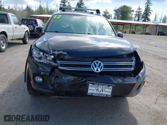 2012 Volkswagen Tiguan SE with VIN WVGBV7AX5CW561368, listed as a IAAI auction lot 42197389 with 63,809 mi miles and . Bid and sale history available at DreamBid. Image 6.