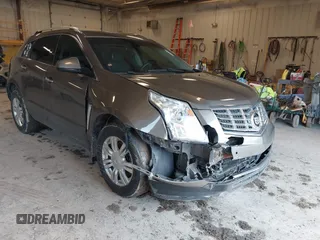 2015 Cadillac SRX Luxury Collection with VIN 3GYFNBE34FS575613, listed as a IAAI auction lot 41697251 with 173,117 mi miles and . Bid and sale history available at DreamBid. Image 6.