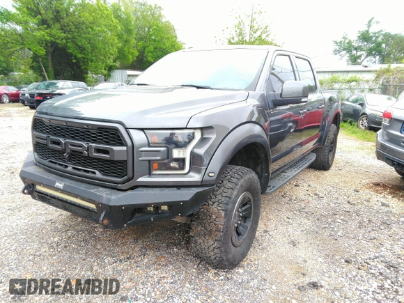 2017 Ford F-150 Raptor with VIN 1FTFW1RG8HFA31164, listed as a IAAI auction lot 42125542 with 164,745 mi miles and . Bid and sale history available at carsss.com. Image 20.