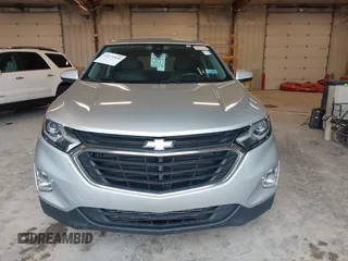 2019 Chevrolet Equinox LT z VIN 3GNAXJEV9KS633657, wystawiony jako IAAI lot #42379968 z przebiegiem 75 398 mil mil oraz . Historia ofert i sprzedaży dostępna na DreamBid. Obrazek 12.