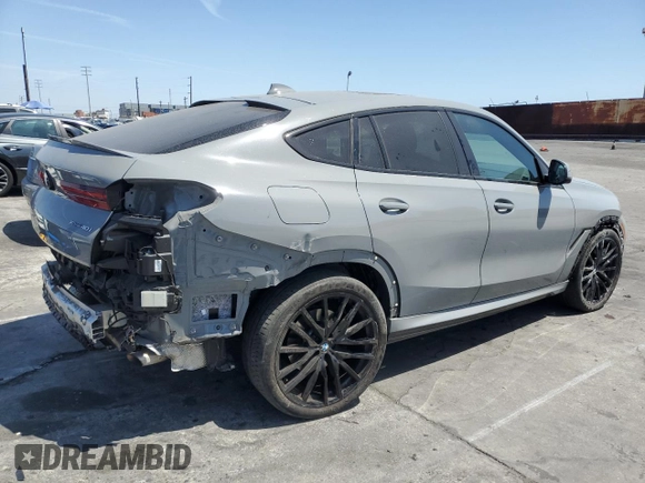 2022 BMW X6 xDrive40i z VIN 5UXCY6C01N9M95573, wystawiony jako Copart lot #54049805 z przebiegiem 24 031 mil mil oraz Szkoda całkowita • Salvage title. Historia ofert i sprzedaży dostępna na DreamBid. Obrazek 3.