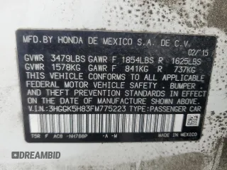 2015 Honda Fit EX-L with VIN 3HGGK5H83FM775223, listed as a Copart auction lot 63779045 with Not provided miles and Salvage title. Bid and sale history available at DreamBid. Image 12.