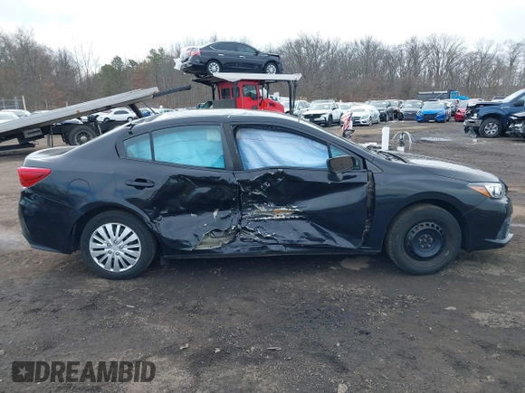 2020 Subaru Impreza with VIN 4S3GKAB69L3602396, listed as a IAAI auction lot 41621494 with 63,952 mi miles and . Bid and sale history available at DreamBid. Image 13.
