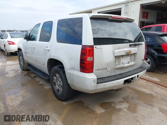 2010 Chevrolet Tahoe LS with VIN 1GNMCAE3XAR215407, listed as a IAAI auction lot 41570899 with 197,401 mi miles and . Bid and sale history available at DreamBid. Image 3.