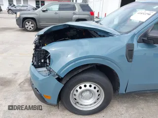 2023 Ford Maverick XL z VIN 3FTTW8E37PRA74216, wystawiony jako IAAI lot #41852290 z przebiegiem 21 849 mil mil oraz . Historia ofert i sprzedaży dostępna na DreamBid. Obrazek 6.