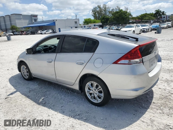 2010 Honda Insight EX with VIN JHMZE2H74AS032878, listed as a Copart auction lot 56230795 with 125,838 mi miles and Clean title. Bid and sale history available at DreamBid. Image 2.