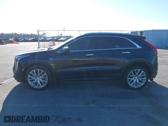 2021 Cadillac XT4 FWD Luxury with VIN 1GYAZAR46MF074767, listed as a IAAI auction lot 41652091 with 46,631 mi miles and . Bid and sale history available at DreamBid. Image 14.