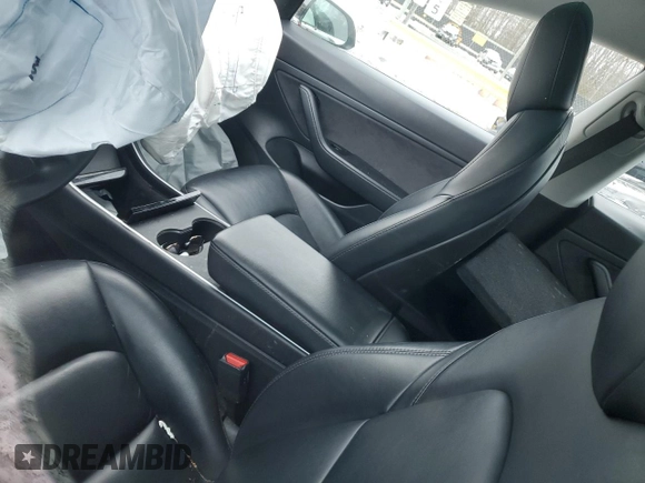 2020 Tesla Model 3 Standard Range Plus with VIN 5YJ3E1EAXLF661031, listed as a Copart auction lot 87912605 with Not Provided miles and Salvage Title. Bid and sale history available at DreamBid. Image 8.