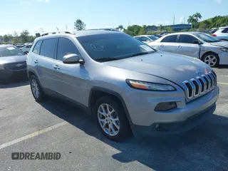 2014 Jeep Cherokee Latitude with VIN 1C4PJLCS6EW103423, listed as a IAAI auction lot 40118289 with 112,120 mi miles and . Bid and sale history available at DreamBid. Image 20.