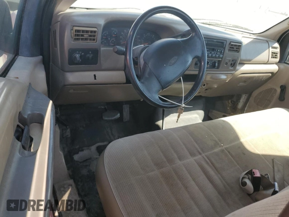 2001 Ford F-250 XL z VIN 1FTNF21L31EC98816, wystawiony jako Copart lot #72825944 z przebiegiem 145 083 mil mil oraz Szkoda całkowita • Salvage title. Historia ofert i sprzedaży dostępna na DreamBid. Obrazek 8.
