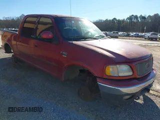 2001 Ford F-150 SuperCrew XLT with VIN 1FTRW08W61KA21021, listed as a IAAI auction lot 41636186 with 1 mi miles. Bid and sale history available at carsss.com. Image 1.