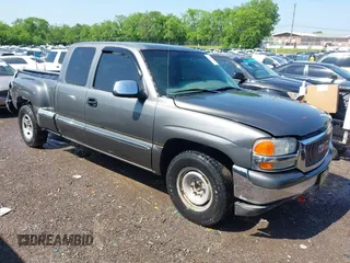 2001 GMC Sierra 1500 SLE z VIN 2GTEC19V011229575, wystawiony jako IAAI lot #42130015 z przebiegiem 210 922 mil mil oraz . Historia ofert i sprzedaży dostępna na DreamBid. Obrazek 1.