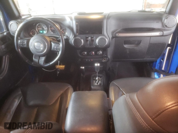 2015 Jeep Wrangler Willys Wheeler with VIN 1C4AJWAG2FL568130, listed as a Copart auction lot 80682914 with 111,686 mi miles and Salvage title. Bid and sale history available at DreamBid. Image 8.
