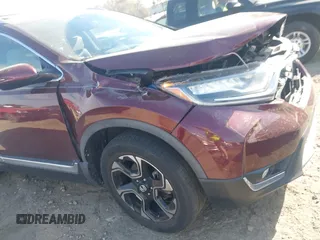 2018 Honda CR-V Touring with VIN 7FARW2H9XJE064414, listed as a IAAI auction lot 41904372 with 88,219 mi miles and . Bid and sale history available at carsss.com. Image 18.