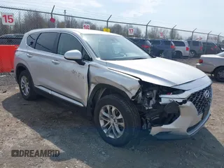 2019 Hyundai Santa Fe SE z VIN 5NMS2CADXKH116590, wystawiony jako IAAI lot #42118500 z przebiegiem 93 731 mil mil oraz . Historia ofert i sprzedaży dostępna na DreamBid. Obrazek 1.