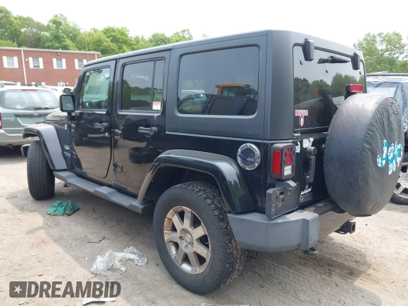 2015 Jeep Wrangler Unlimited Sahara with VIN 1C4HJWEG3FL661568, listed as a IAAI auction lot 42387810 with 140,927 mi miles and . Bid and sale history available at DreamBid. Image 3.