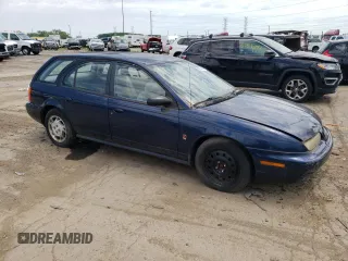 1997 Saturn SW z VIN 1G8ZK8279VZ361444, wystawiony jako Copart lot #58929684 z przebiegiem 128 554 mil mil oraz Tytuł czysty. Historia ofert i sprzedaży dostępna na DreamBid. Obrazek 4.