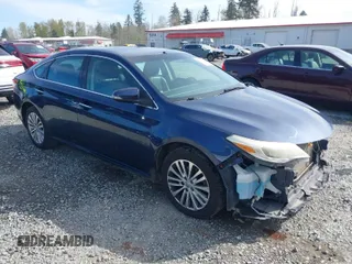 2014 Toyota Avalon Limited with VIN 4T1BK1EB3EU078237, listed as a IAAI auction lot 42033607 with 80,977 mi miles. Bid and sale history available at carsss.com. Image 1.