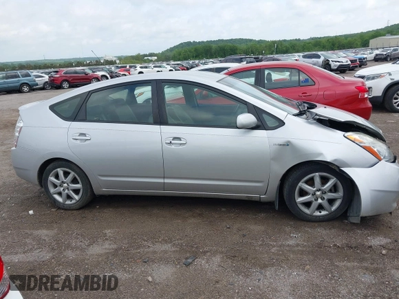 2007 Toyota Prius z VIN JTDKB20U873273942, wystawiony jako IAAI lot #42113046 z przebiegiem 126 635 mil mil oraz . Historia ofert i sprzedaży dostępna na DreamBid. Obrazek 14.