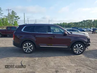 2022 Kia Telluride EX z VIN 5XYP34HCXNG263769, wystawiony jako IAAI lot #42273847 z przebiegiem 20 557 mil mil oraz . Historia ofert i sprzedaży dostępna na DreamBid. Obrazek 14.