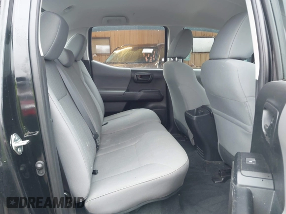2018 Toyota Tacoma SR with VIN 3TMCZ5AN3JM184455, listed as a IAAI auction lot 41446859 with 44,187 mi miles and . Bid and sale history available at DreamBid. Image 8.