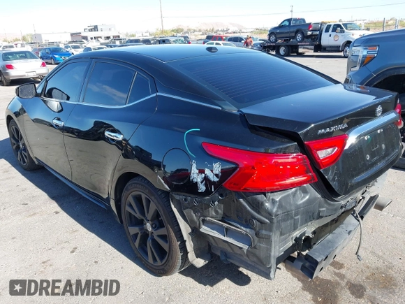 2018 Nissan Maxima SL with VIN 1N4AA6AP5JC369619, listed as a IAAI auction lot 42045980 with 88,184 mi miles and . Bid and sale history available at DreamBid. Image 3.