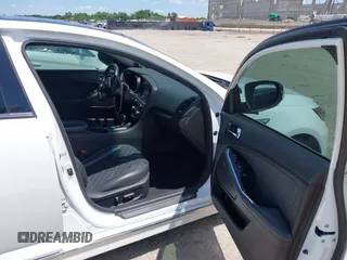 2015 Kia Optima SX Turbo with VIN 5XXGR4A68FG411149, listed as a IAAI auction lot 42451249 with 246,125 mi miles and . Bid and sale history available at DreamBid. Image 5.